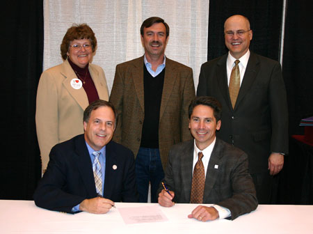 Bluefield College and Leland Seminary sign a transfer agreement.